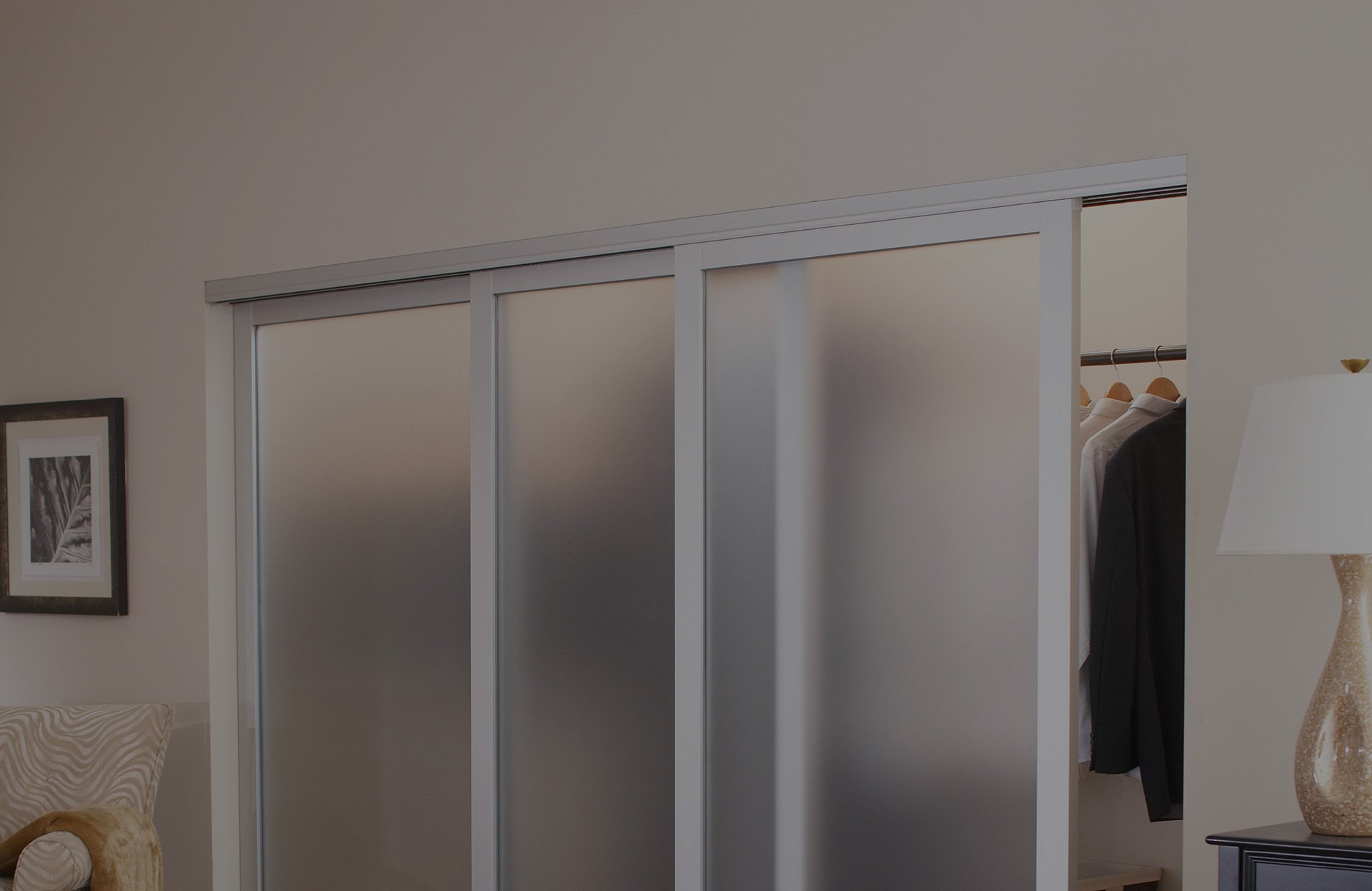 Wardrobe slider system — when the whole wall is the closet, a matched wardrobe system beats standard bypass