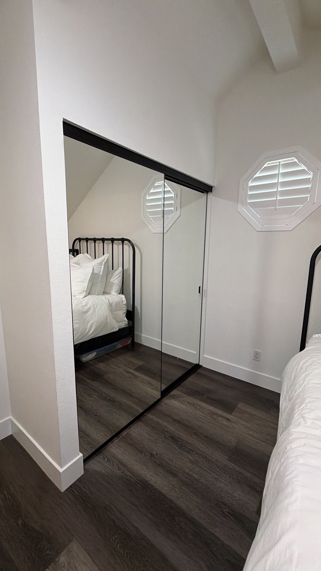 After: new black frame mirror sliding closet doors in Tustin, CA