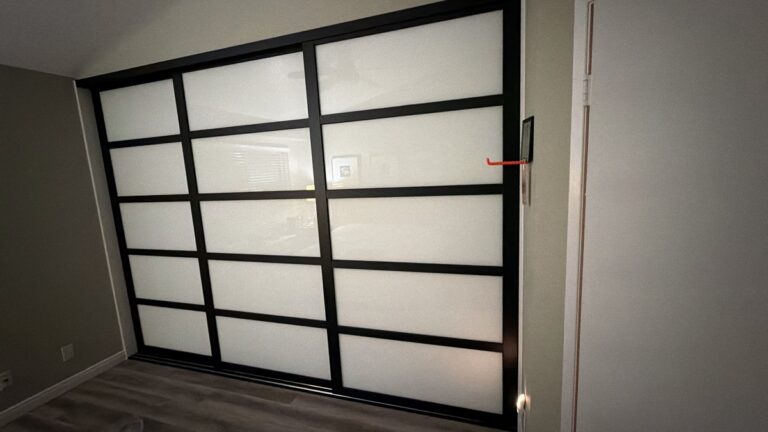 Black grid frosted glass closet doors installed by The Door Replacement Company, serving Gardena, CA