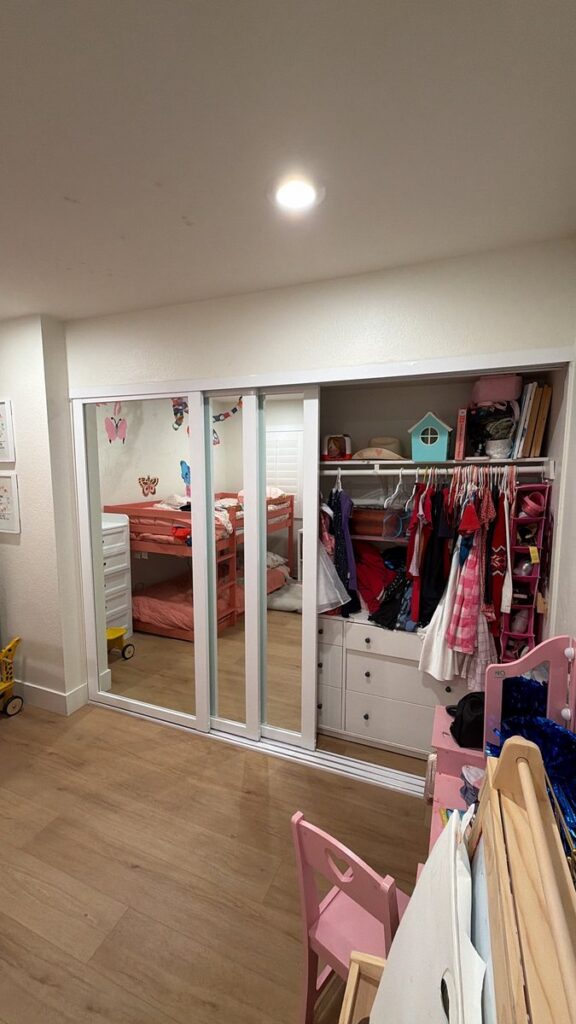 Mirror closet doors bedroom installed by The Door Replacement Company, serving Paramount, CA