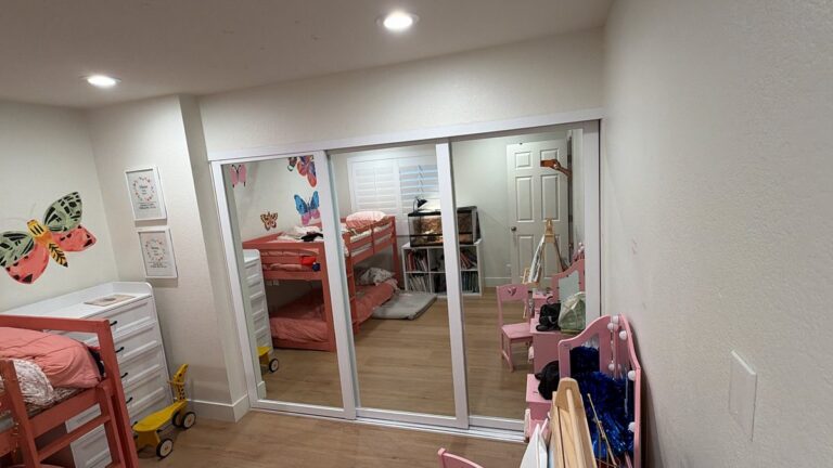 Mirror closet doors bunk bed room installed by The Door Replacement Company, serving Cerritos, CA