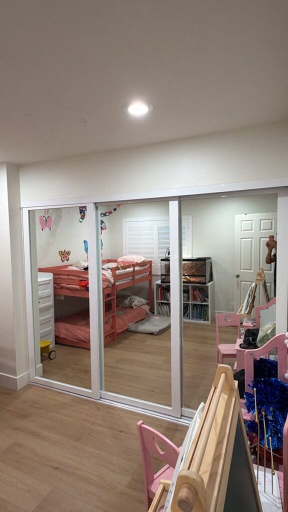 Mirror sliding closet doors kids room installed by The Door Replacement Company, serving Gardena, CA