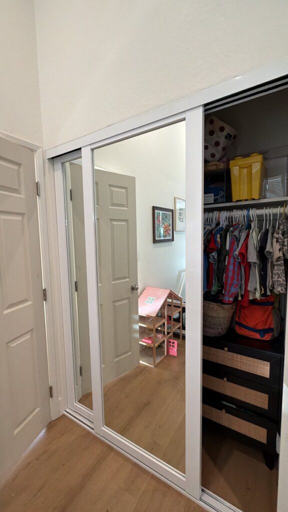 White mirror closet doors open installed by The Door Replacement Company, serving Gardena, CA