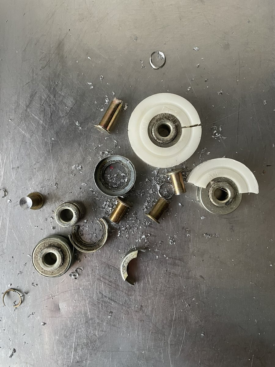 Worn closet door rollers replaced during a repair